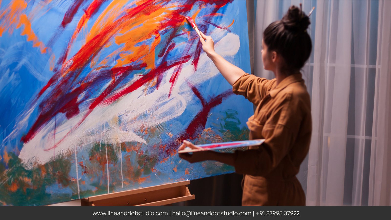 understanding what is art with a woman painting on a canvas