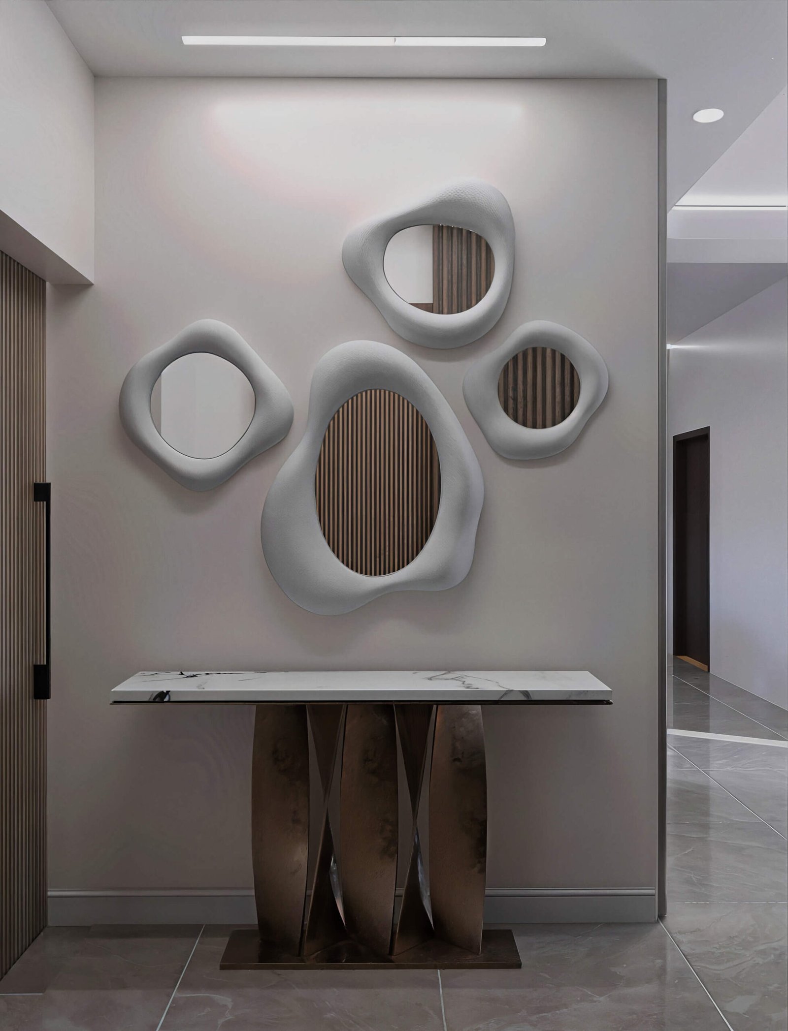 House of Mirrors, grand entrance foyer in a soft beige and grey palette