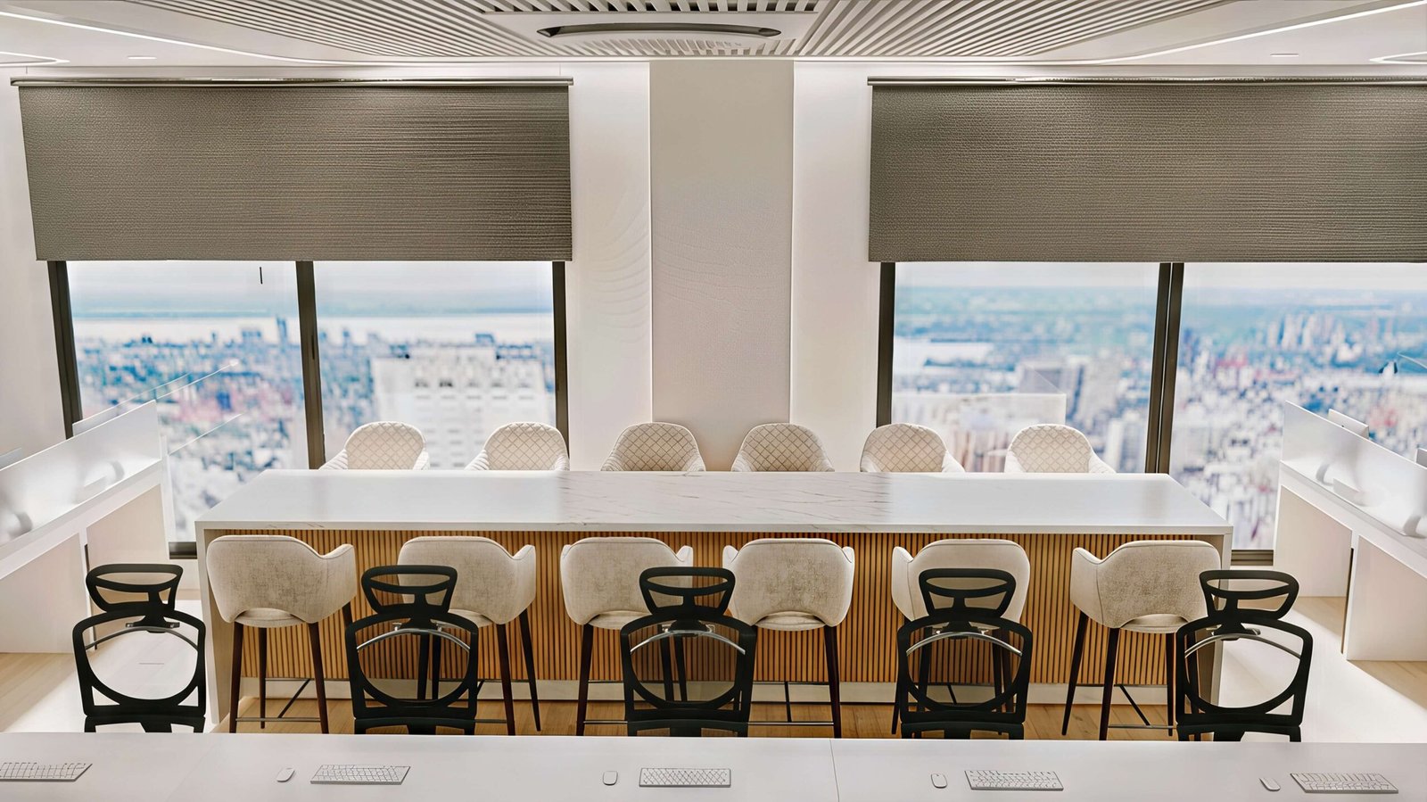 Glass & Green, marble breakout bar with stools against floor-to-ceiling windows