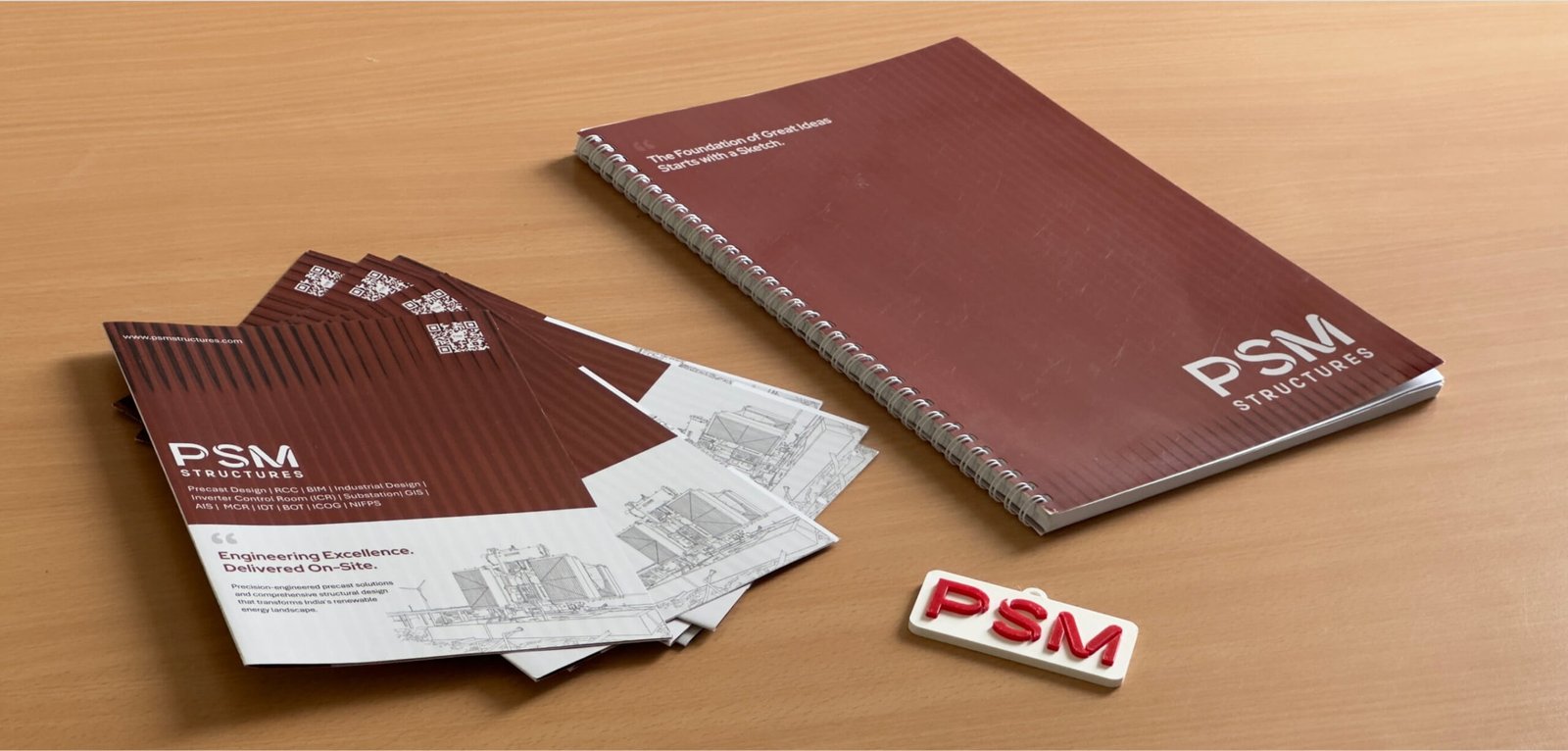 PSM Structures brochures, notebook and branded badge
