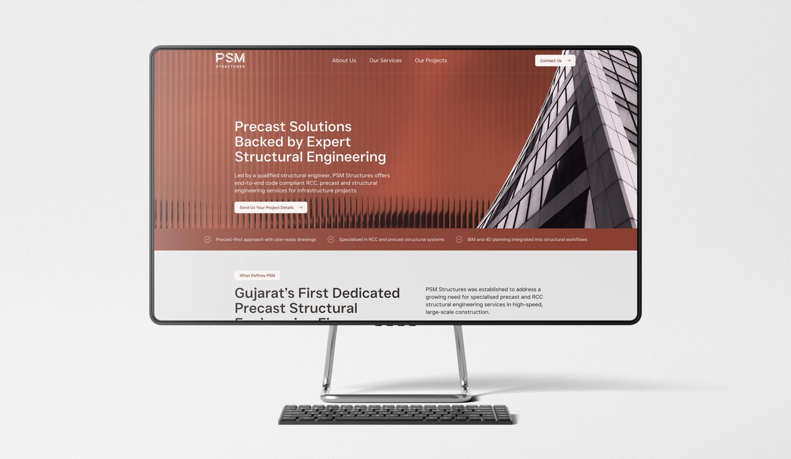 PSM Structures website homepage shown on a desktop monitor