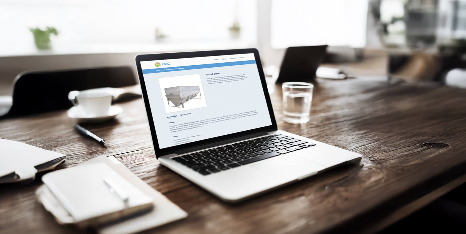 A close view of the BEC website on a laptop screen