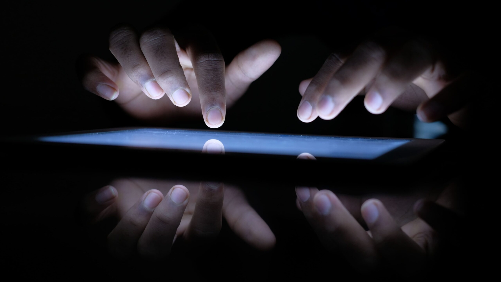 close-up-of-hacker-hand-stealing-data-from-digital-2024-12-13-12-20-40-utc (1)