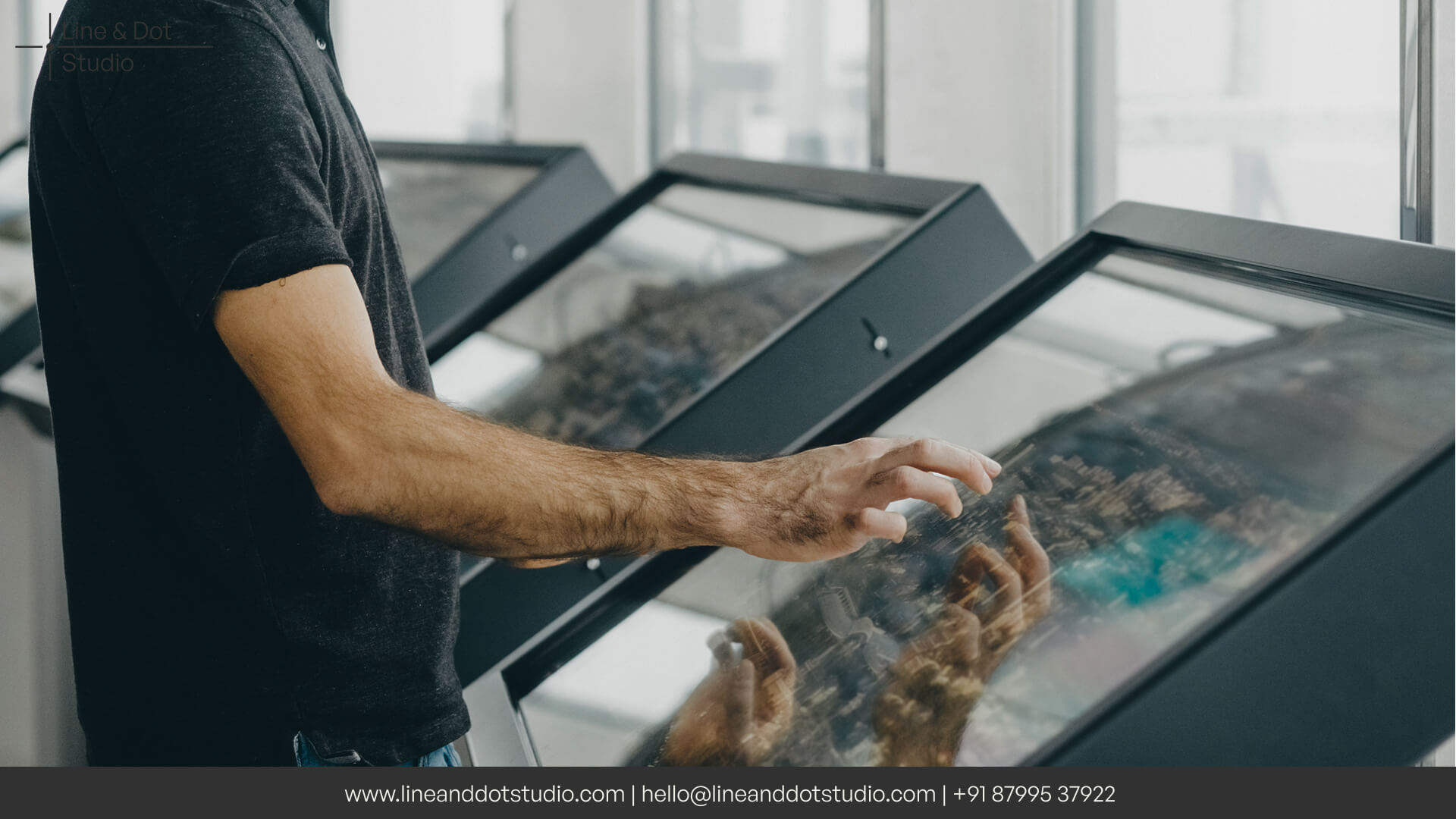 Touchscreen kiosk for visitor engagement at trade show as part of interactive exhibition design